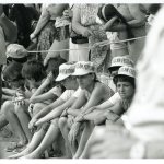 Coll-21-no-acc-Clam-Fest-workers-in-hats-watching-parade